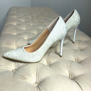 Stiletto white, shiny silver heels 6.5
